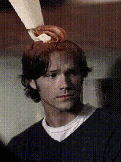 Man's Head With Chocolate Frosting Swirl GIF