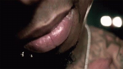 Man's Mouth With Ear Buds GIF