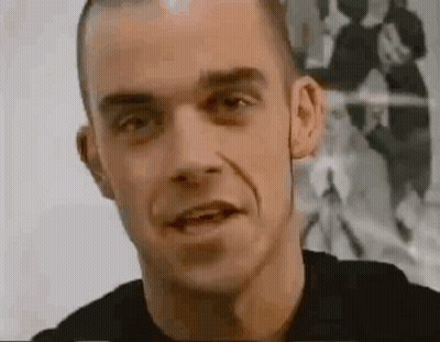Man's Smiling Face GIF