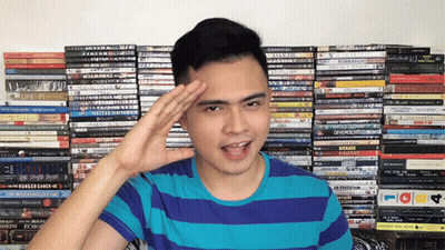 Man Salutes Stack Of DVDs Saying Life Fi GIF
