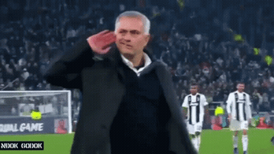 Man Saluting On Soccer Field With Players GIF