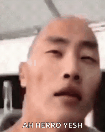 Man Saying Ah Herro Yesh GIF