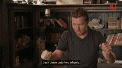 Man Saying Back Down Onto Two Wheels GIF