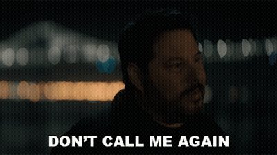 Man Saying Don't Call Me Again In Front Of Bridge GIF
