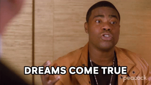 Man Saying Dreams Come True In Peacock Jacket GIF