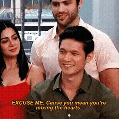 Man Saying Excuse Me Mixing Hearts GIF