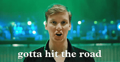 Man Saying Gotta Hit The Road In Front Of Green Lights GIF