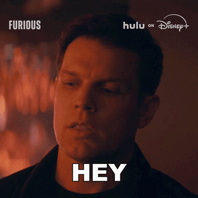 Man Saying Hey In Front Of Disney Logo GIF
