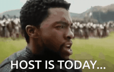 Man Saying Host Is Today In Front Of Group GIF