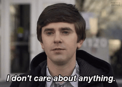 Man Saying I Don't Care About Anything In Front Of Building GIF