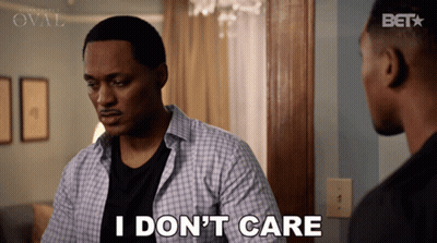 Man Saying I Don't Care To Another Man GIF