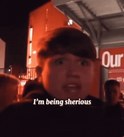 Man Saying I'm Being Sherious by Red Sign