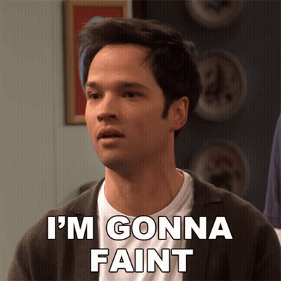 Man Saying I'm Gonna Faint In Front Of Picture Wall GIF