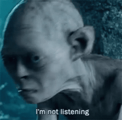 Man Saying I'm Not Listening GIF