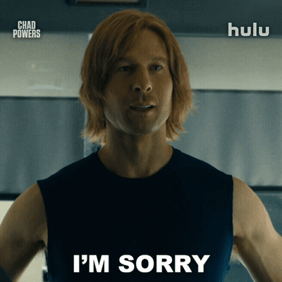 Man Saying I'm Sorry In Front Of Hulu Sign GIF