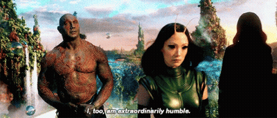 Man Saying I Too Am Extraordinarily Humble Beside Woman GIF