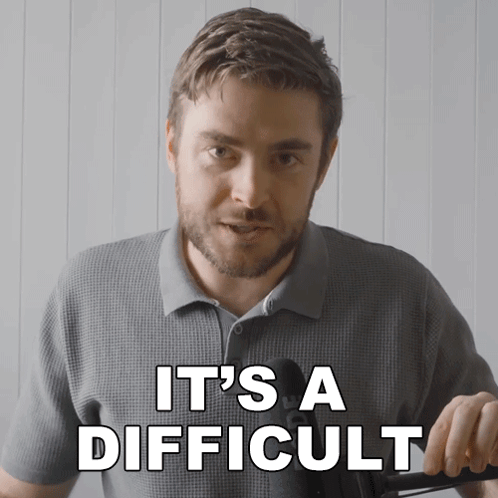 Man Saying It's A Difficult While Holding Something GIF