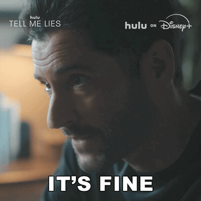 Man Saying It's Fine In Front Of Hulu On Disney+ Sign GIF