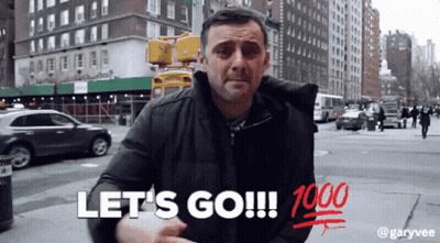 Man Saying Let's Go On City Street GIF