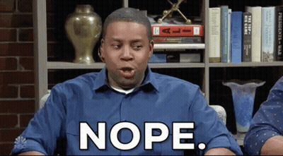 Man Saying Nope In Front Of Bookshelf GIF
