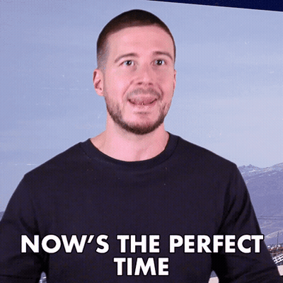 Man Saying Now's The Perfect Time With Mountain Background GIF