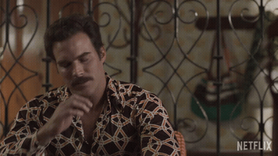 Man Saying Por Esta In Front Of Wrought Iron Gate GIF