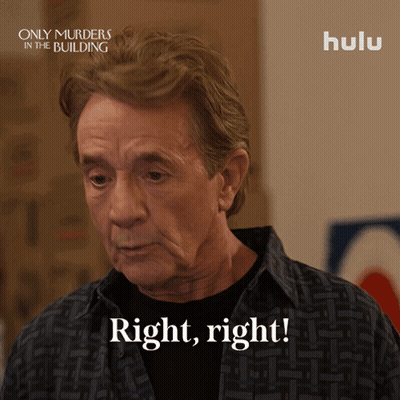 Man Saying Right Right In Front Of Only Murders In The Building Sign GIF