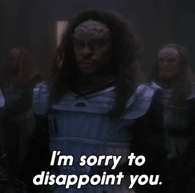 Man Saying Sorry To Disappoint In Dark Room GIF