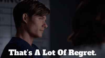 Man Saying That's A Lot Of Regret In Dark Room GIF
