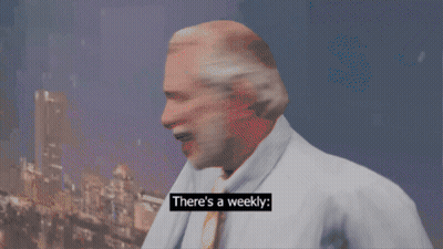 Man Saying There's A Weekly In Front Of Sign GIF