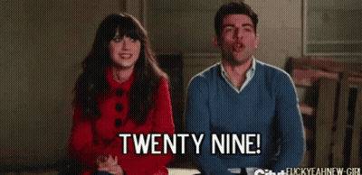 Man Saying Twenty Nine Next To Woman GIF