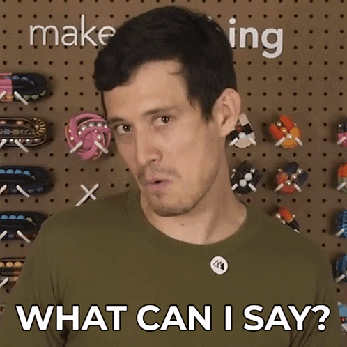 Man Saying What Can I Say In Wall Of Toys GIF