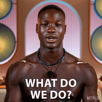 Man Saying What In White Letters GIF