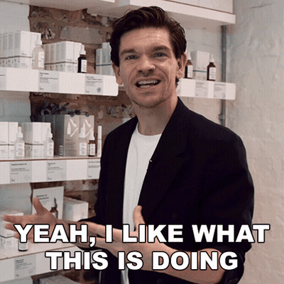 Man Saying Yeah In Front Of Bottles GIF