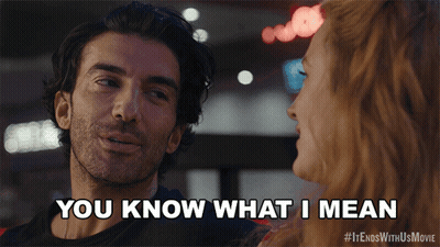 Man Saying You Know What I Mean To Woman GIF