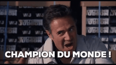 Man Says Champion Du Monde Beside Shelf GIF
