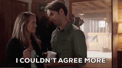 Man Says I Couldn't Agree More Next To Woman GIF