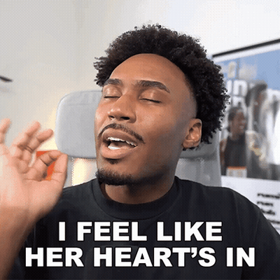 Man Says I Feel Like Her Heart's In While Sitting In Chair GIF