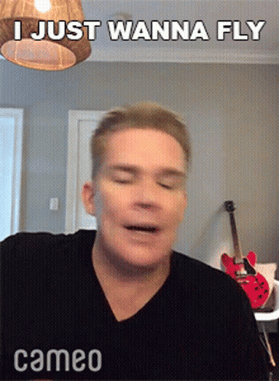 Man Says I Just Wanna Fly In Front Of Red Guitar GIF