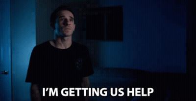 Man Says I'm Getting Us Help Dark Room GIF