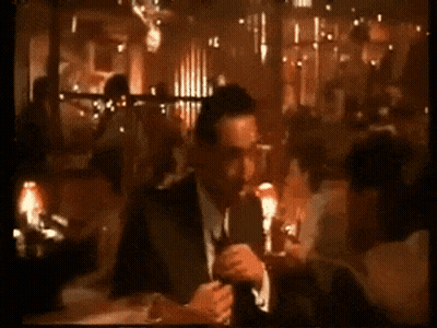 Man Says I'm Gonna Go Get The Papers In Dark Room GIF