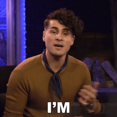 Man Says I'm In Brown Sweater And Blue Scarf GIF