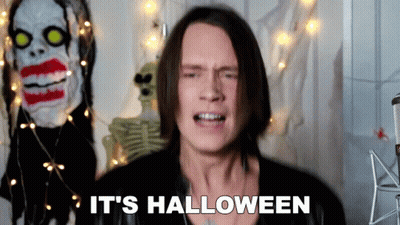Man Says It's Halloween In Front Of Skeleton GIF