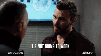 Man Says It's Not Going To Work In Front Of Police Sign GIF