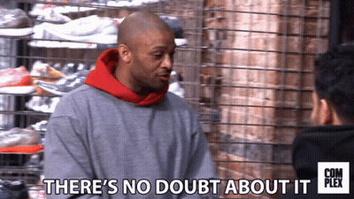 Man Says No Doubt About It In Front Of Shoe Rack GIF