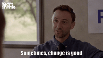 Man Says Sometimes Change Is Good In Front Of Heart & Home Sign GIF