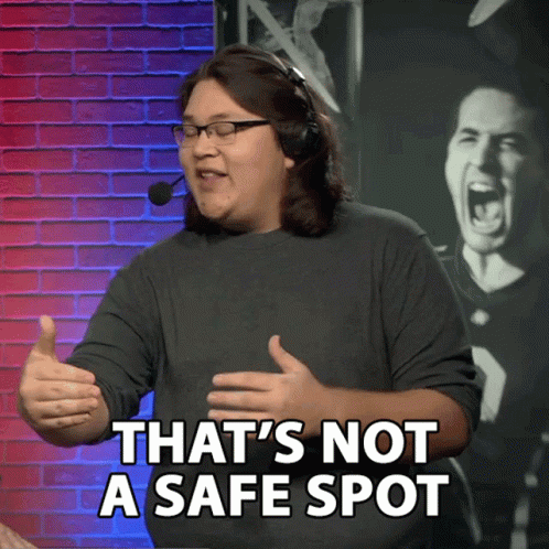 Man Says That's Not A Safe Spot In Front Of Football Player GIF