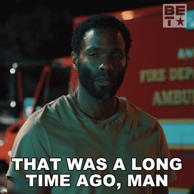 Man Says That Was A Long Time Ago Man In Front Of Fire Truck GIF