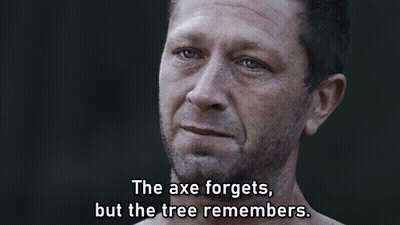 Man Says The Axe Forgets But The Tree Remembers In Dark Room