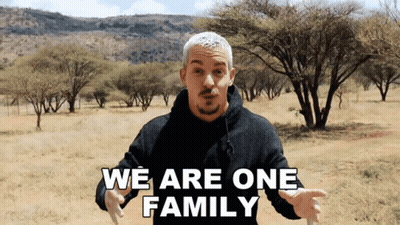 Man Says We Are One Family In Field GIF